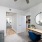a room with a desk and a mirror