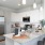 a kitchen with white cabinets