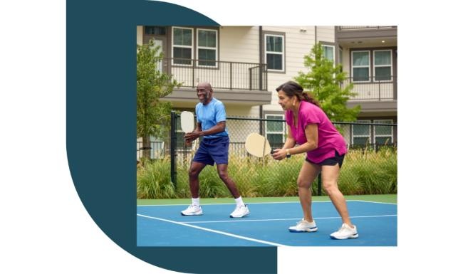 A beautiful community at the heart of all your passions a couple of people play pickleball
